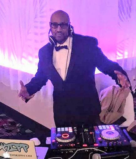 https://djskippmusic.com/wp-content/uploads/2026/04/djskipp-suit-wedding-smaller-434x507.jpg